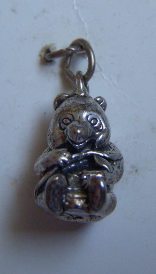 Vintage panda holding bamboo sterling charm