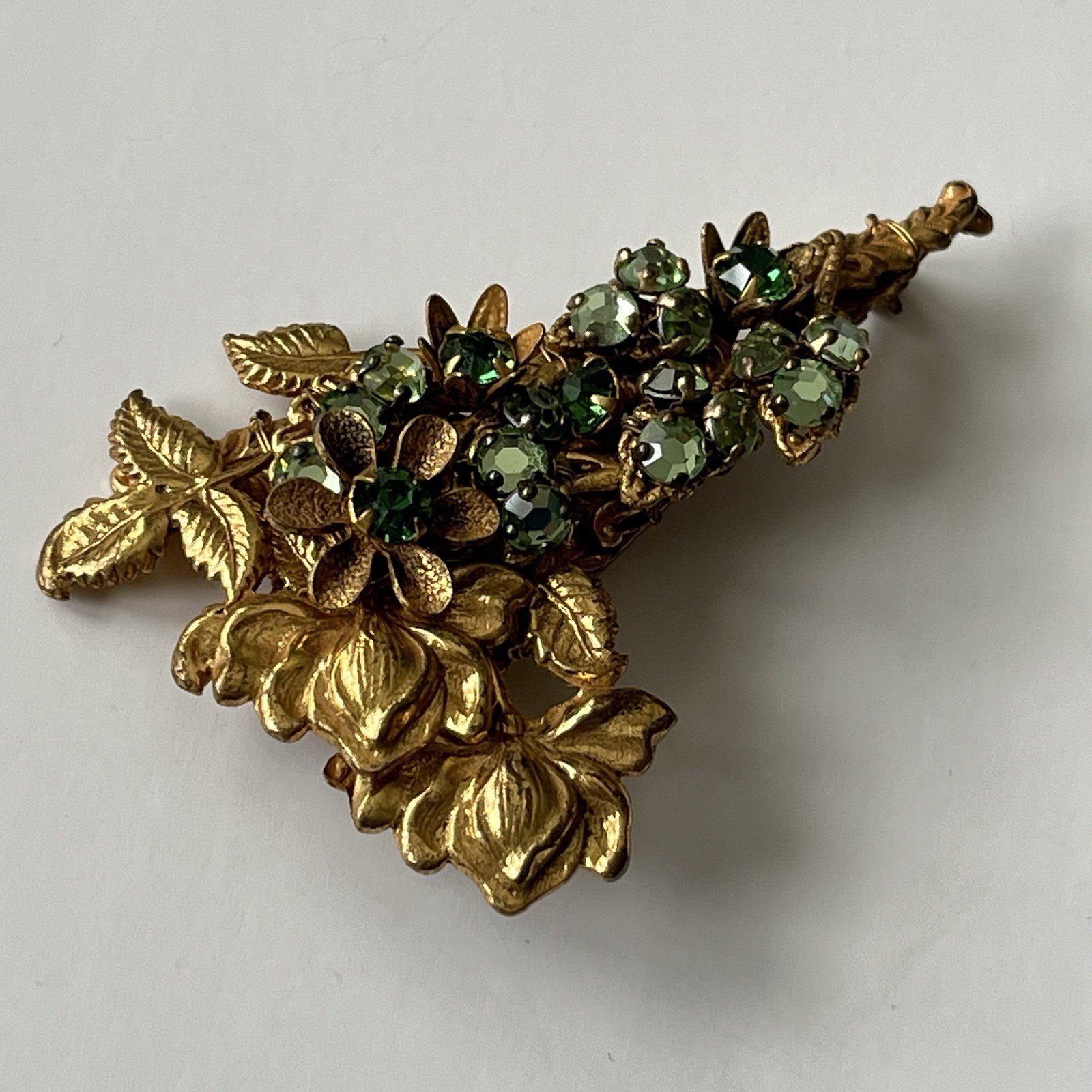 VTG Miriam Haskell Bar Brooch Green Rhinestone Floral Filigree Goldstone Signed