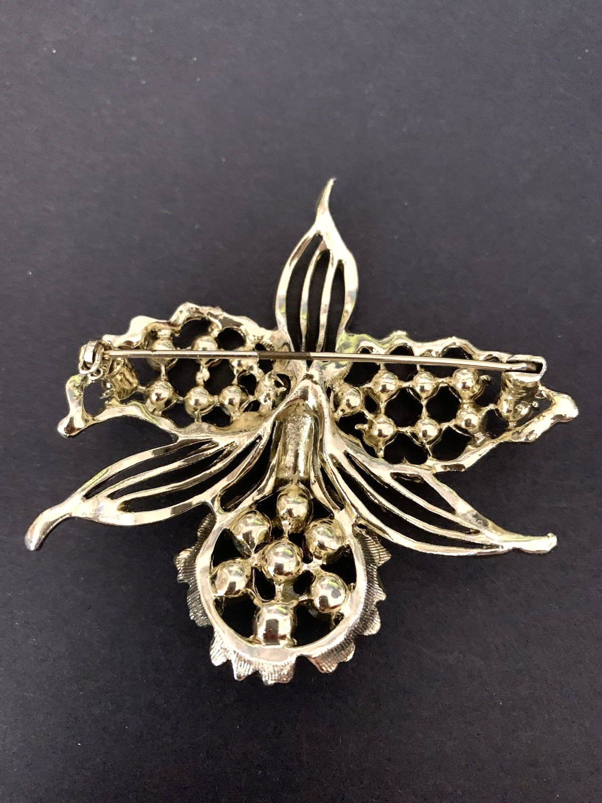 Gold Tone Orchid Brooch with Pink and Purple Stones