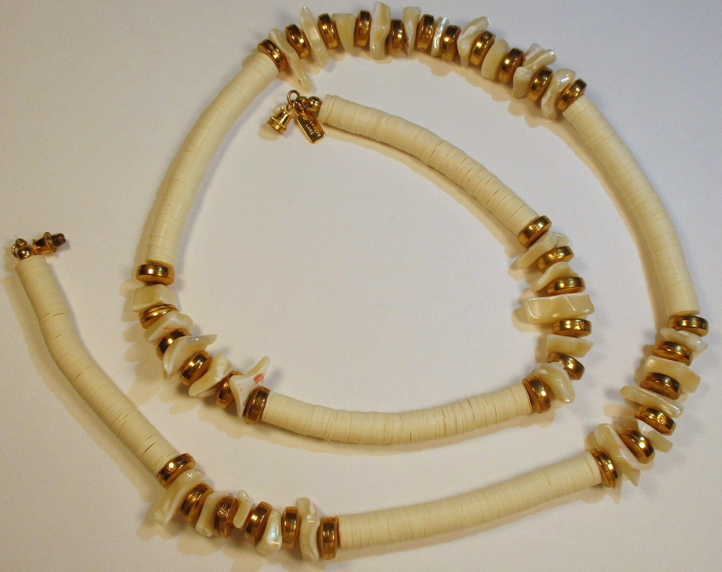 Vintage Kenneth Lane Signed Puca Shell Necklace Accented with Golden Beads