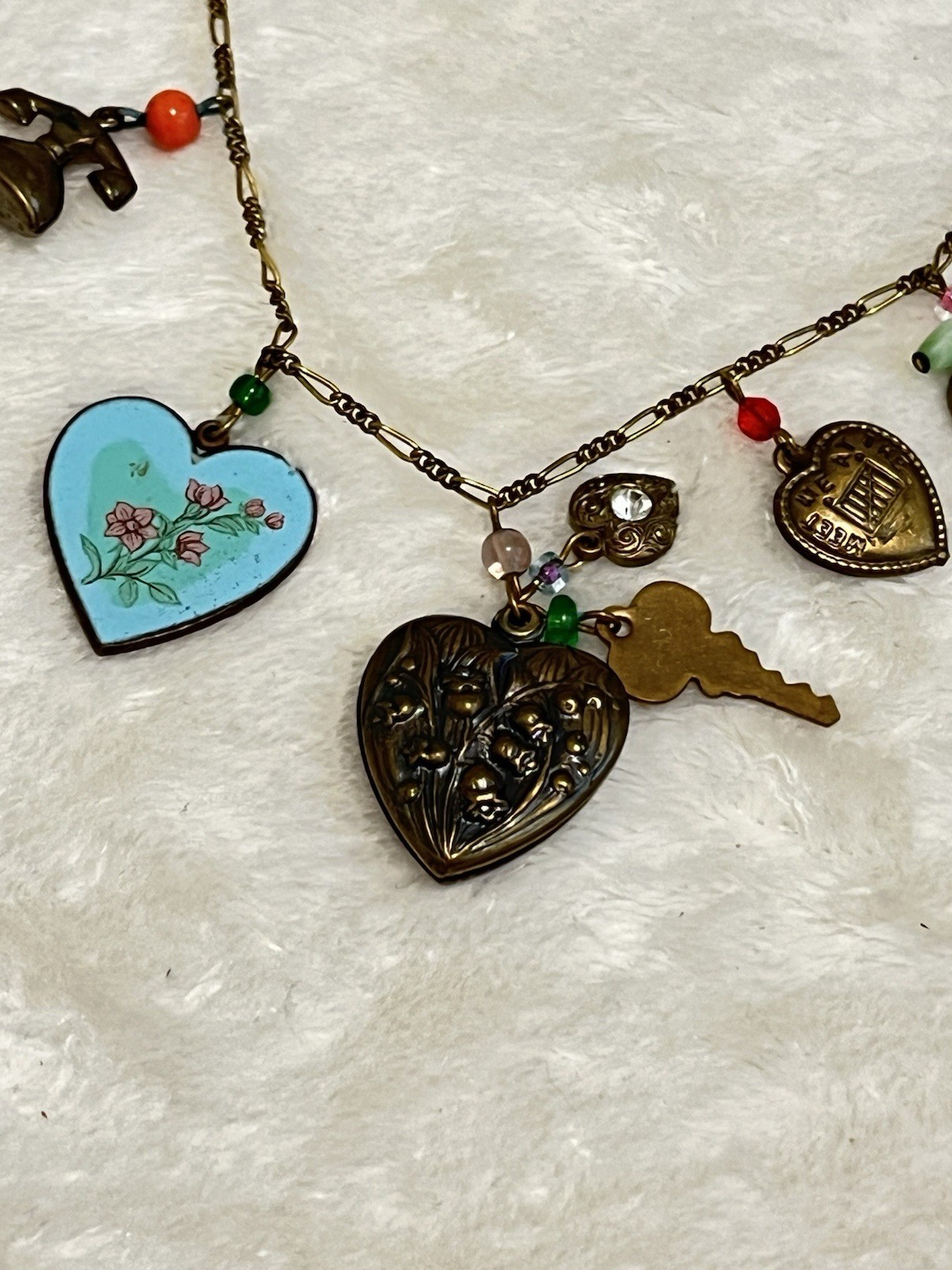 VTG GLASS WORKS STUDIO 19 Charms 29″ Long Bronze Necklace Hearts Lie Detector
