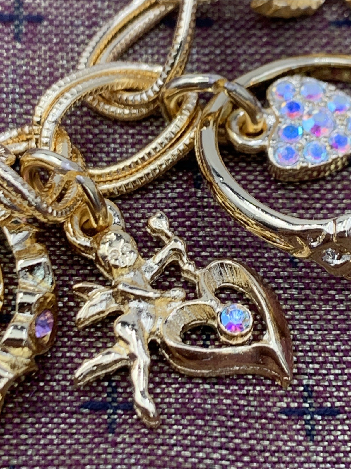 Kirks Folly Gold Tone Charm Bracelet Cupid Hearts Rings Crystals Angel