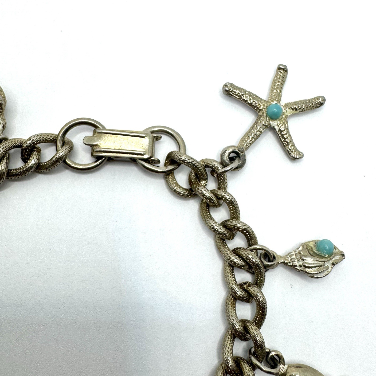 Vtg Charm Bracelet Starfish Ship Conch Shell Faux Turquoise Charms Curb Chain 7″