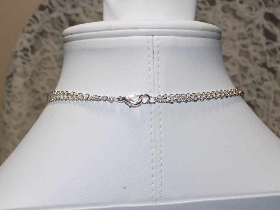 J692-VINTAGE NECKLACE~SILVER TONE WITH BLACK & WHITE DANGLES~17″