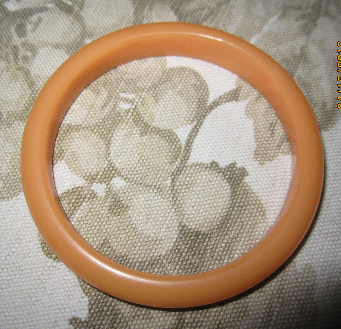 Vintage melon orange acrylic bangle bracelet, 1/2″ wide x 3″ across