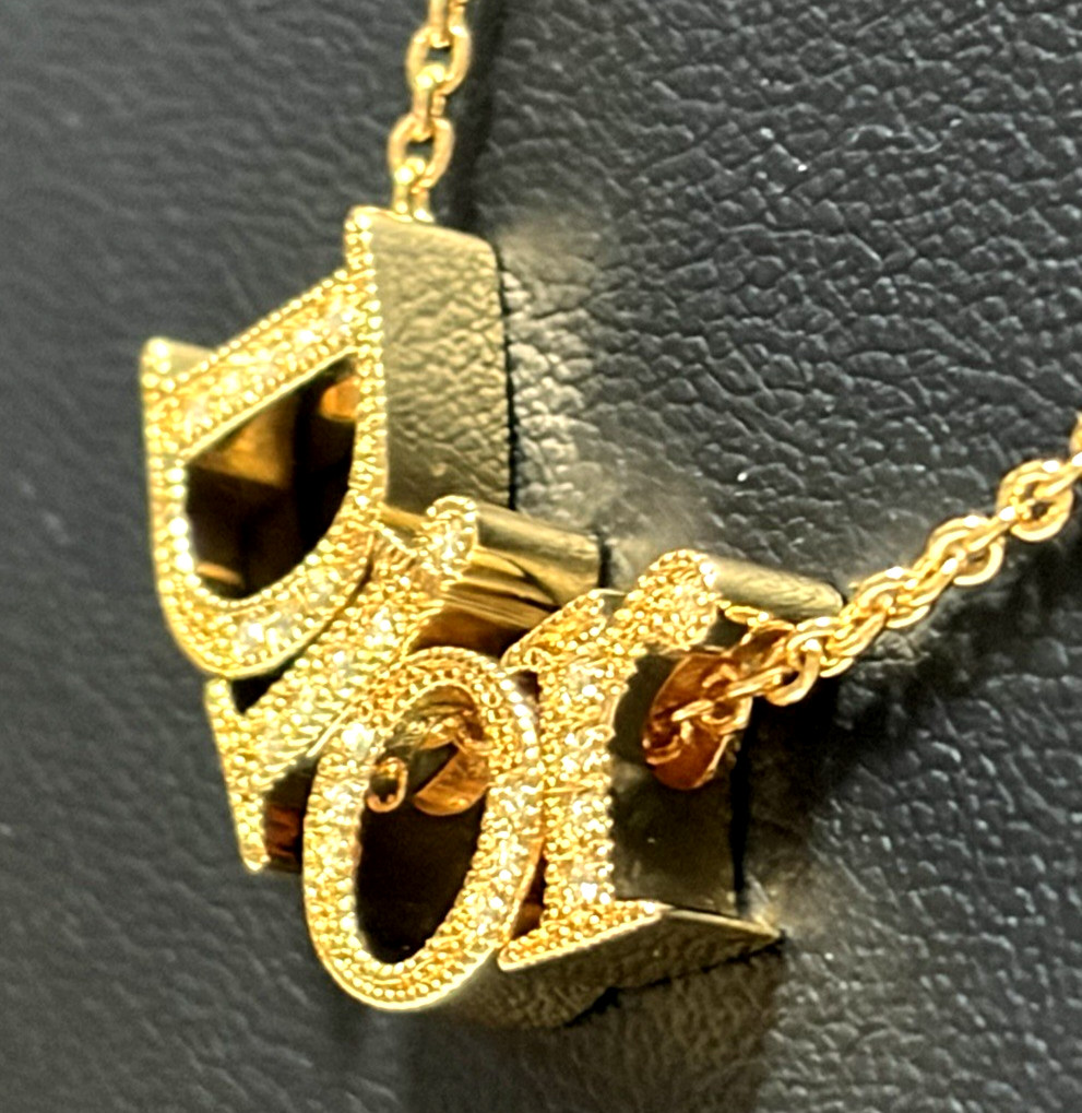 Christian Dior necklace pendant Features the DIOR logo rhinestones gold plating