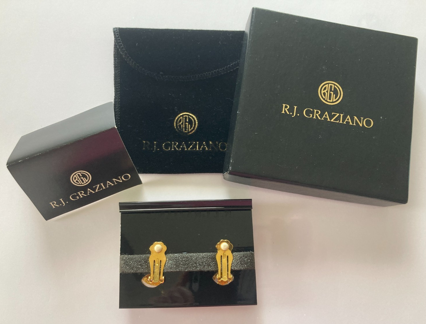 R.J. Graziano Clip on Earrings Blue Stones in Gold Color Setting