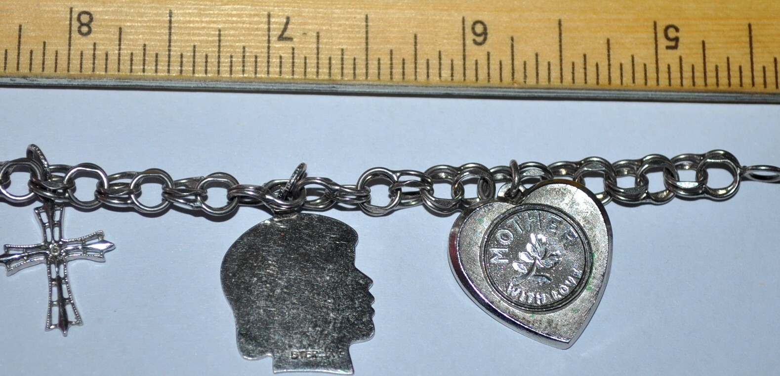Vintage STERLING CHARM BRACELET cross, son, daughter, mom, aquarius .65 troy oz