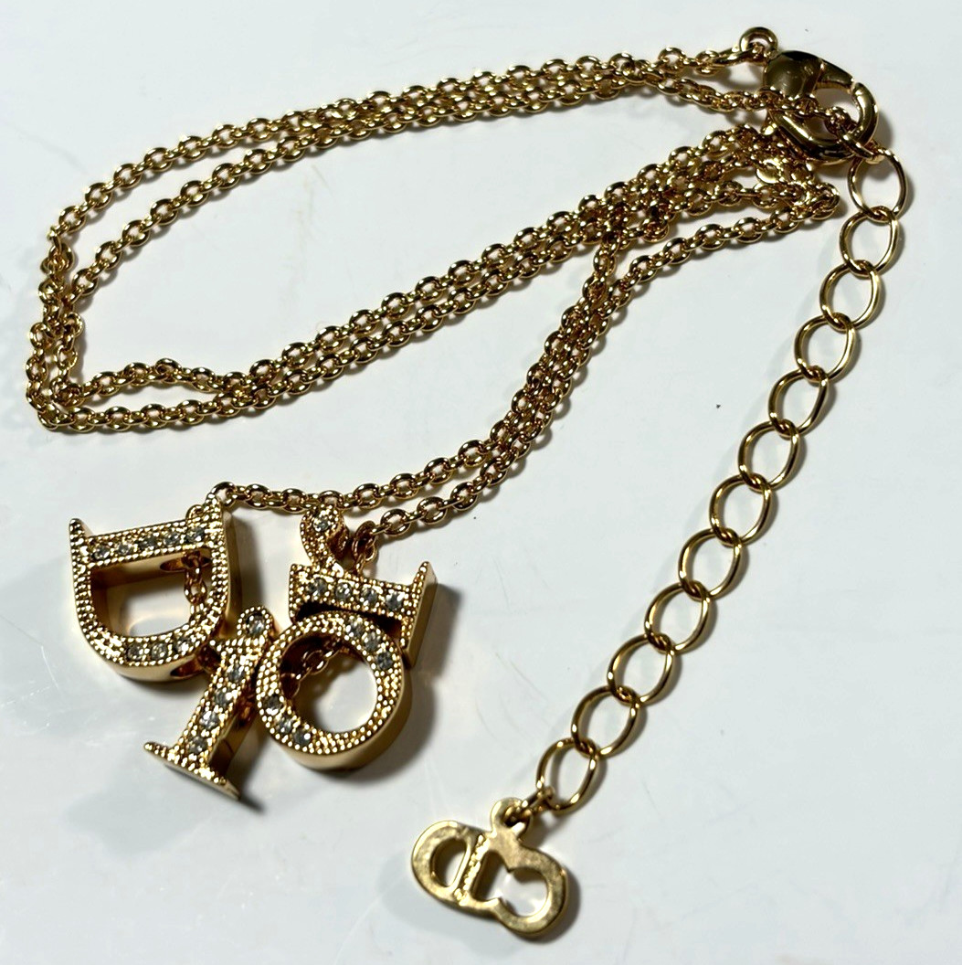 Christian Dior necklace pendant Features the DIOR logo rhinestones gold plating