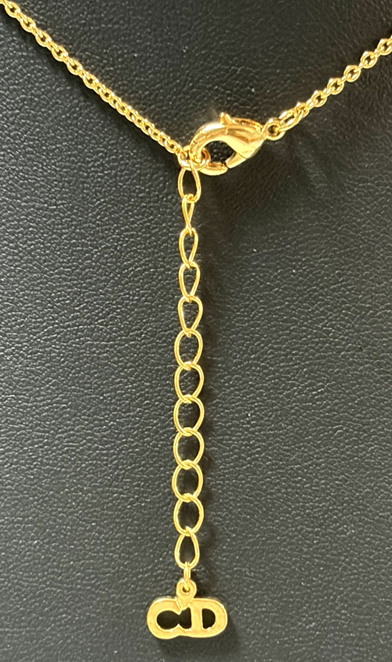 Christian Dior necklace pendant Features the DIOR logo rhinestones gold plating