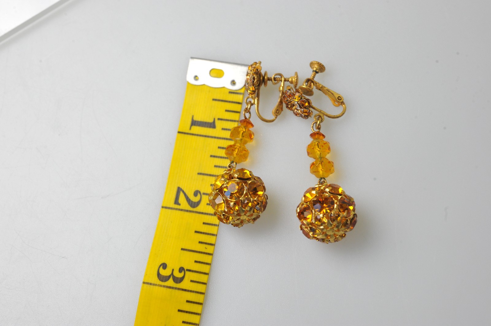 Vtg signed Miriam Haskell rhinestone Gold Tone drop clip earrings amber color