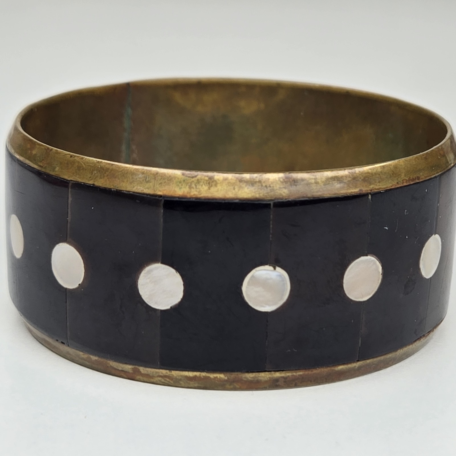 Vintage 8 Inch Gold Tone Metal Black Stone And White Shell Inlay Bangle Bracelet