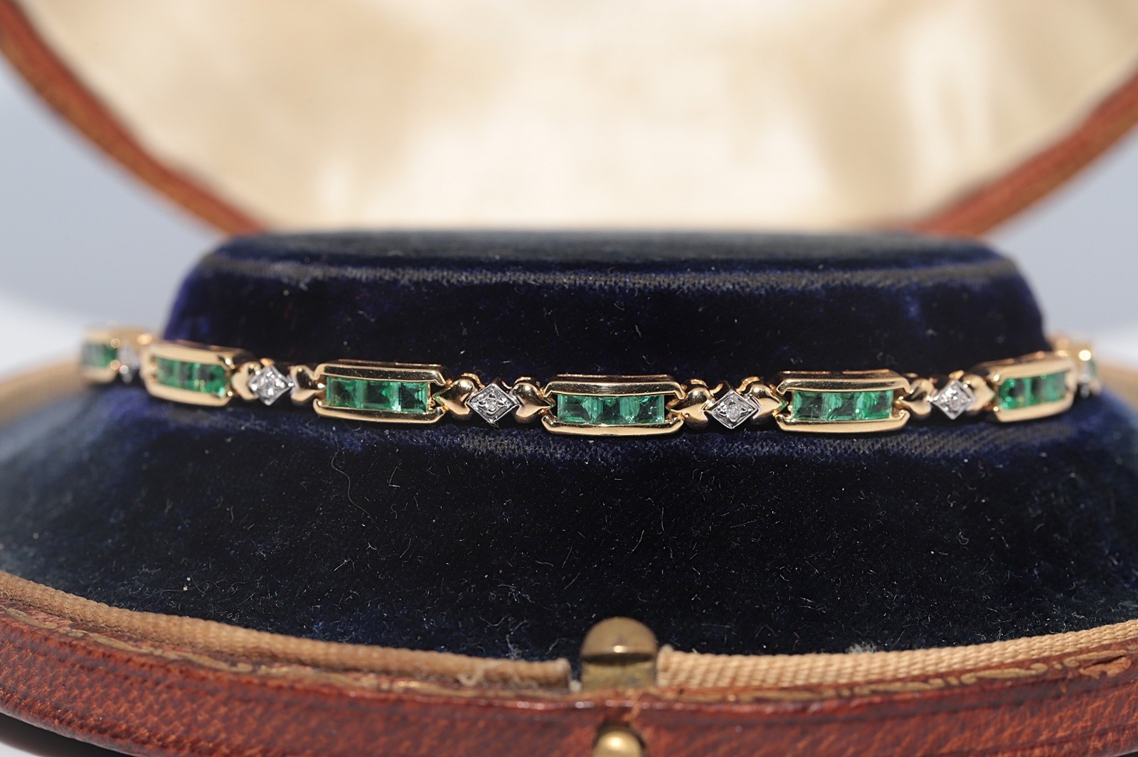 Vintage Circa 1980s 18k Gold Natural Diamond And Caliber Cut Emerald Bracelet