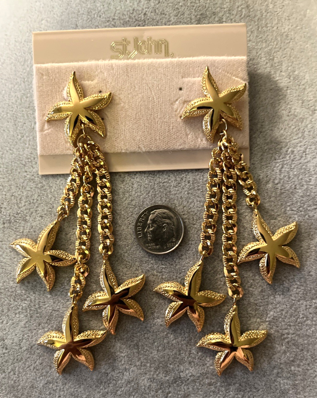 ST. JOHN Gold Plated Dangling Stars Star Fish Post Earrings New on Card 4.25″
