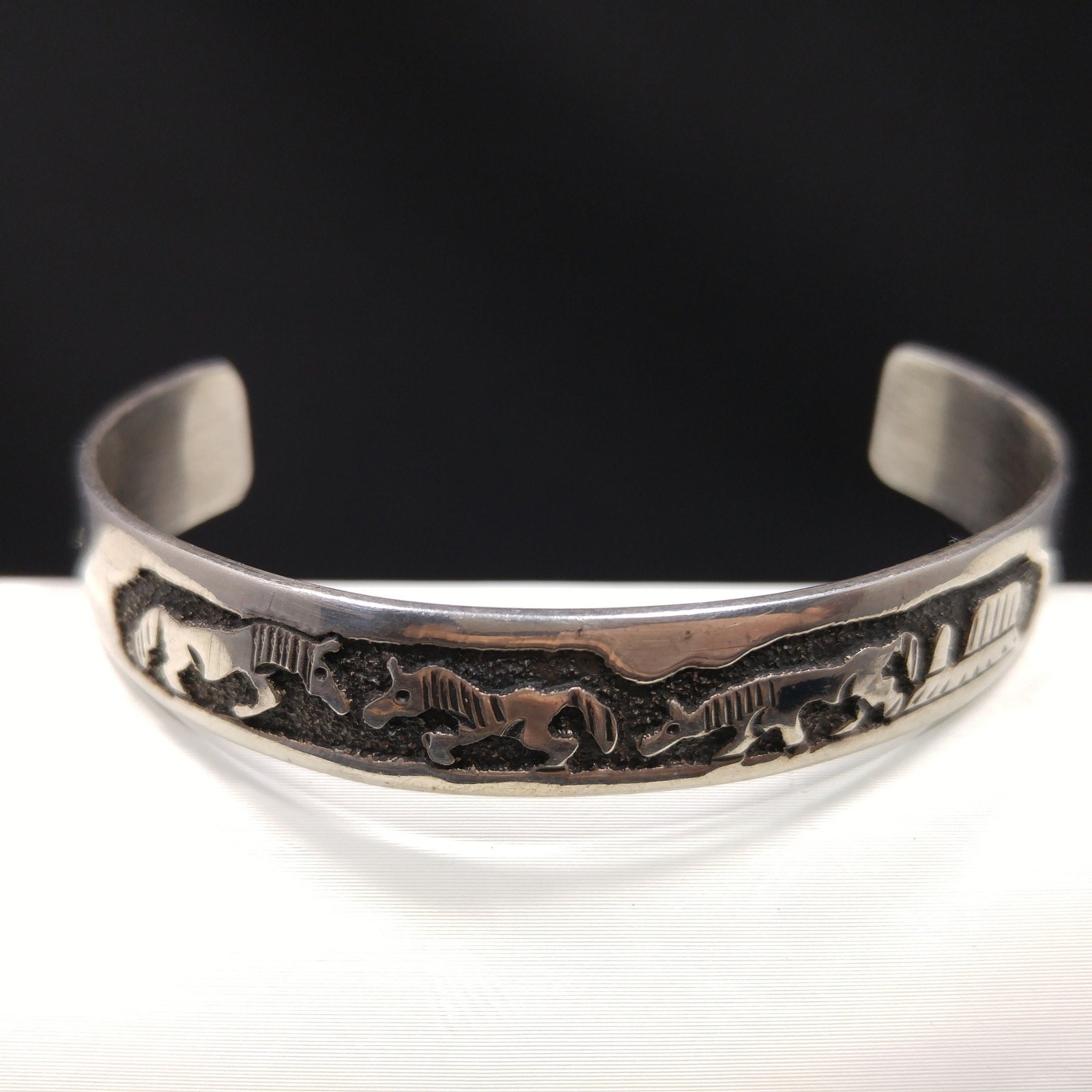 TSK Navajo Sterling Storyteller Child’s Cuff Bracelet – Horses & Daily Life