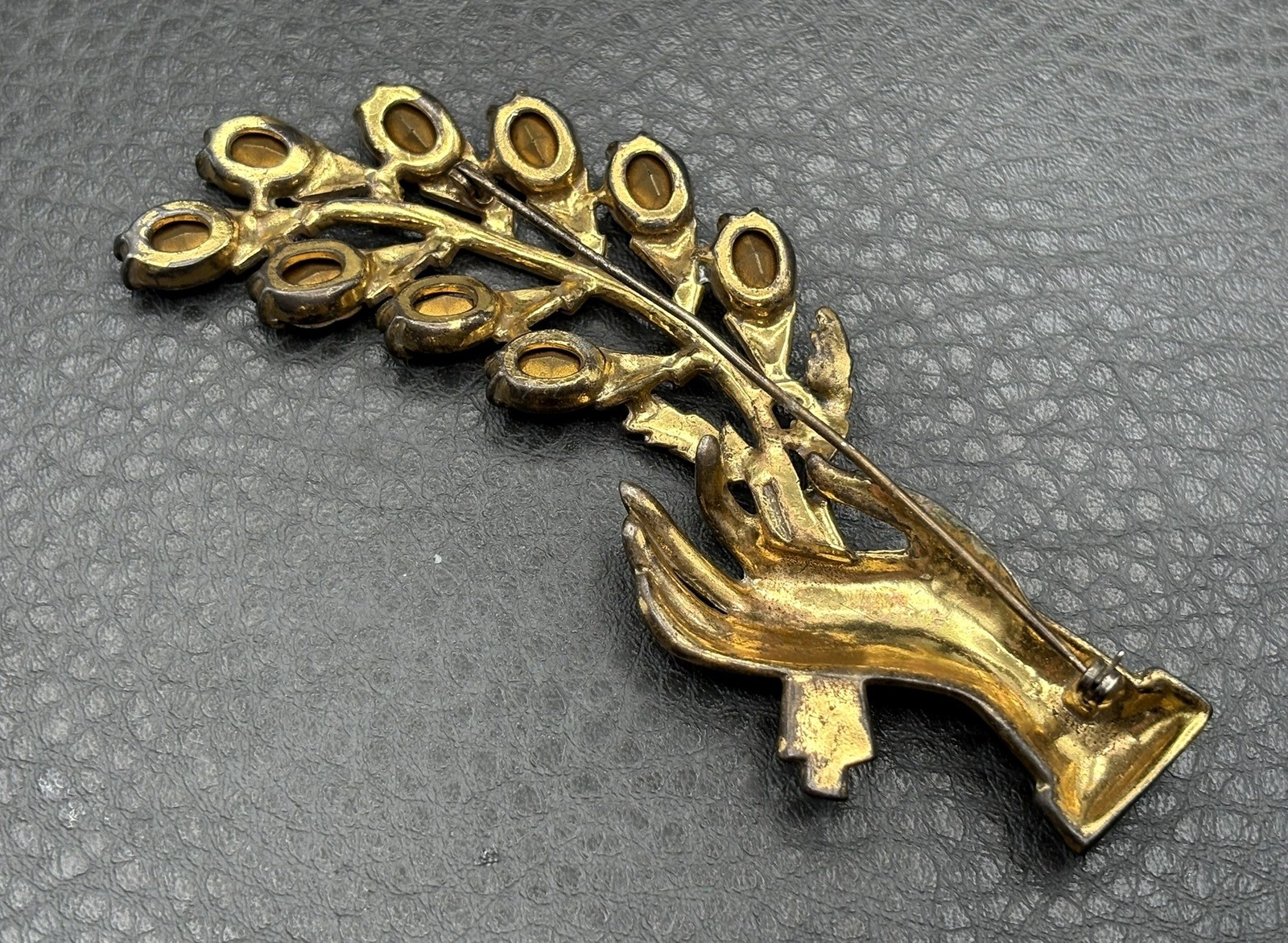 Vintage 4.25” HUGE Pot Metal Hand Holding Flowers Brooch Red Rhinestone