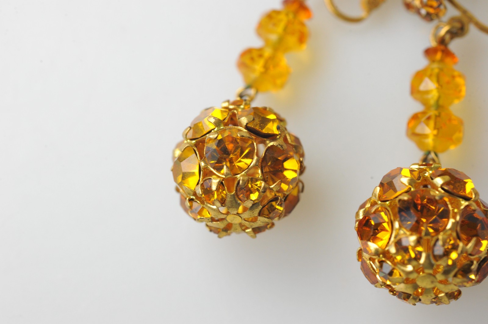 Vtg signed Miriam Haskell rhinestone Gold Tone drop clip earrings amber color