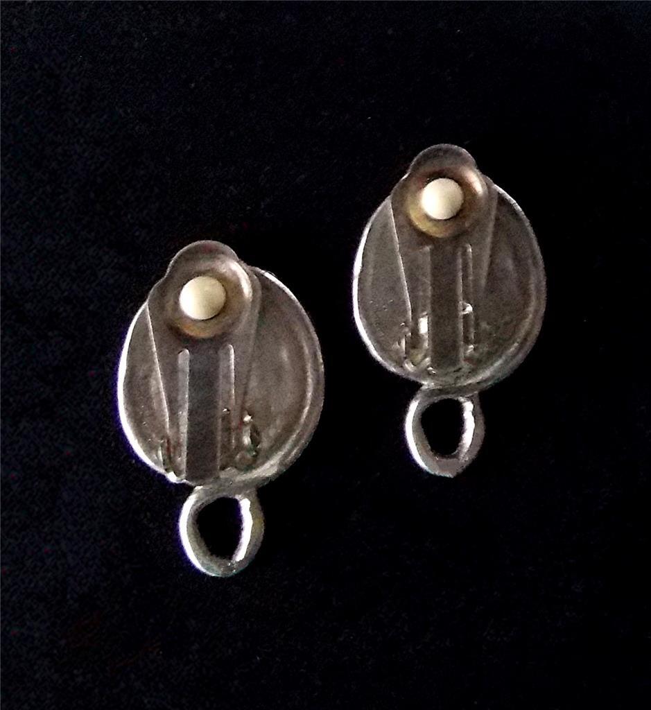 VINTAGE ARTISAN HANDMADE BEAUTIFULLY CRAFTED SILVER CLOSED SPIRAL CLIP EARRINGS