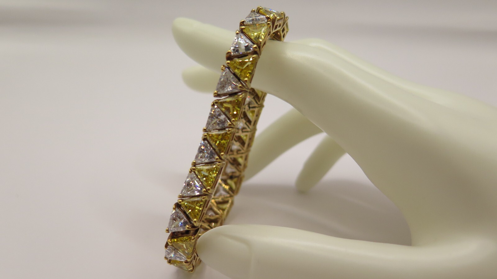 UTC Trillion Cut Tennis Bracelet, Gold Tone