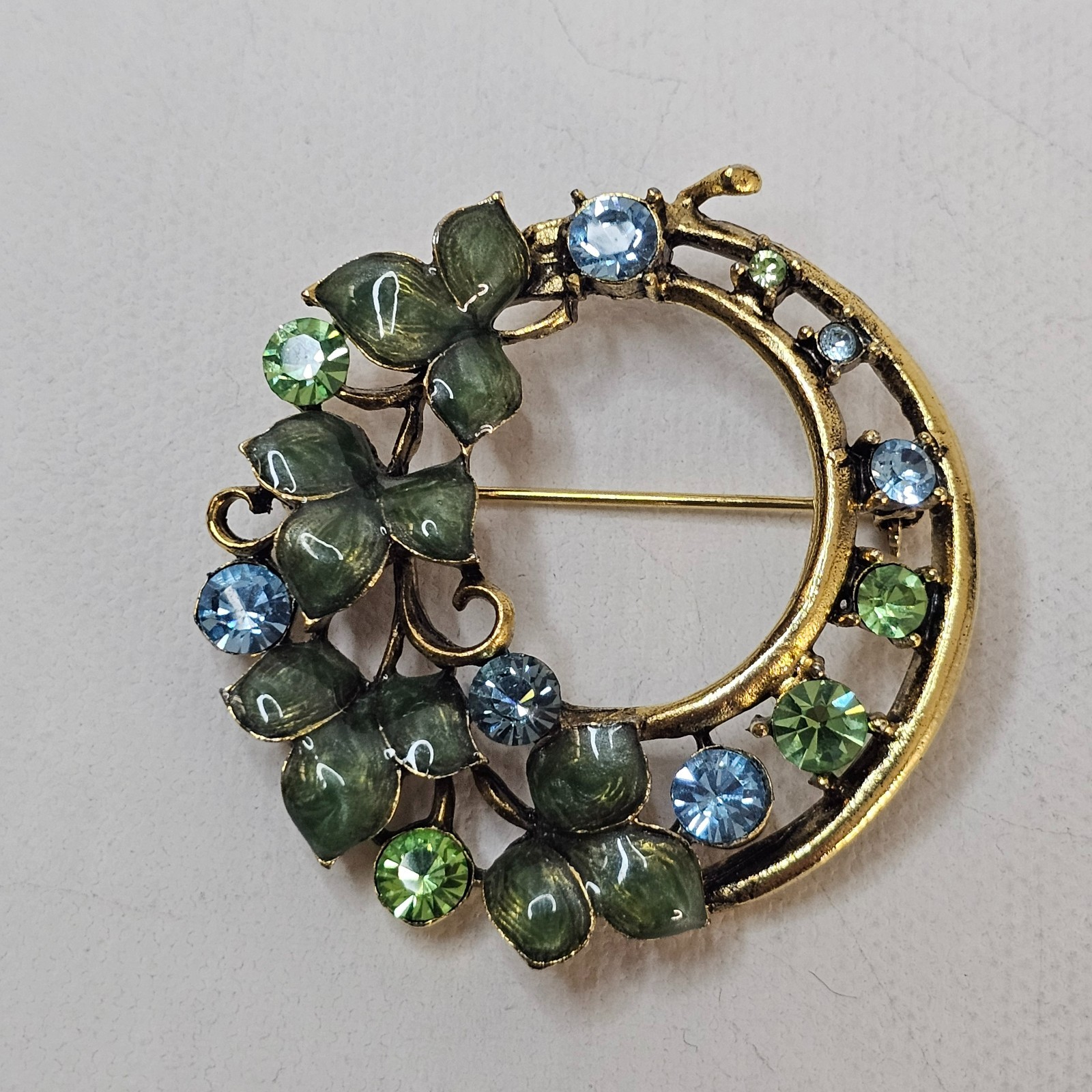 Gold Colored Metal Wreath Brooch Enameled Green Blue Rhinestone Unmarked Pin