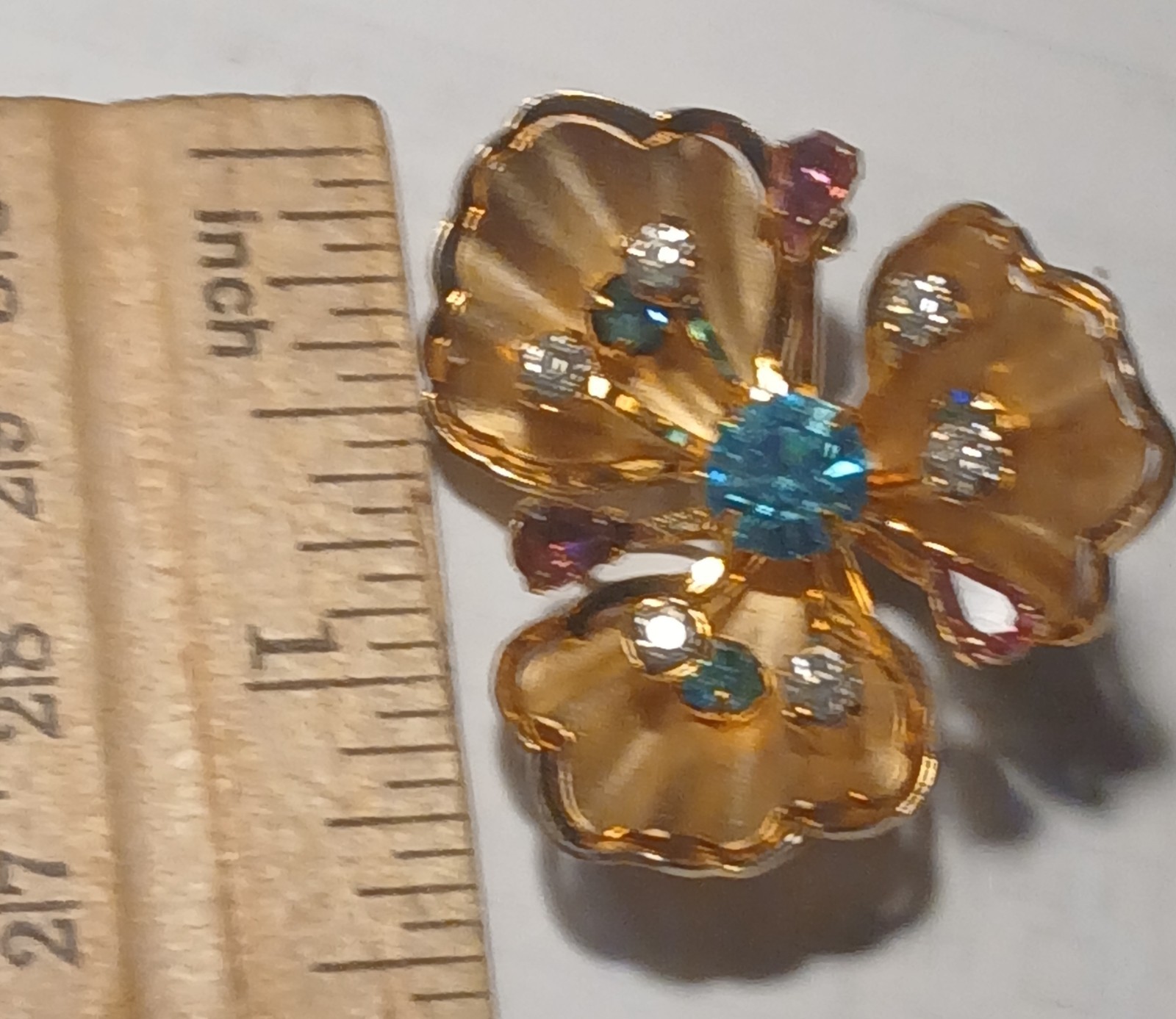 Vintage flower brooch/ pin with multi color rhinestones in gold metal setting
