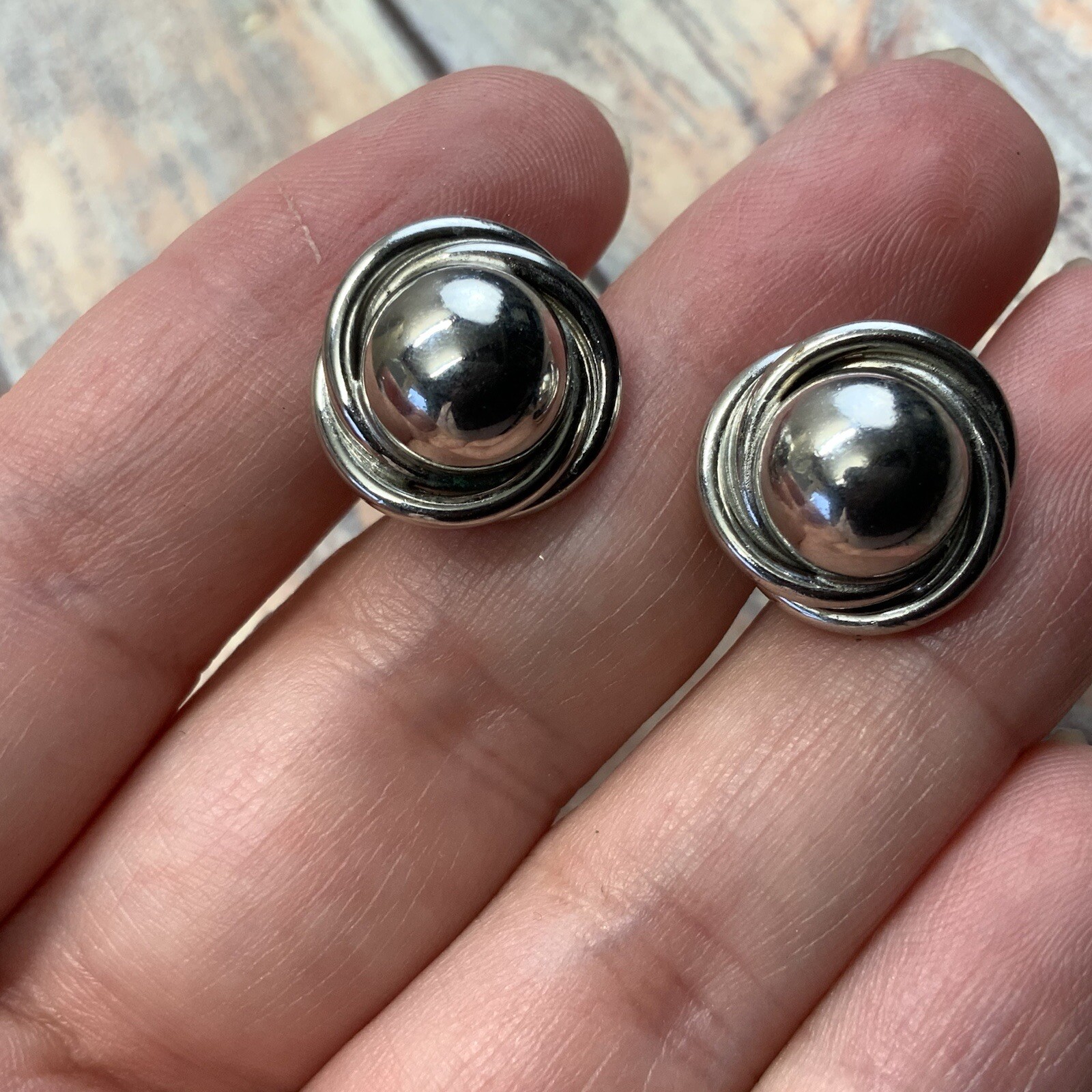 Vintage silver tone screw back knot earrings with dome
