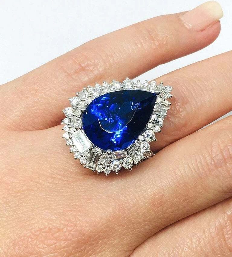Beautiful Pear Shape 13.24CT Tanzanite & Different Shapes 3CT Shiny CZ Halo Ring