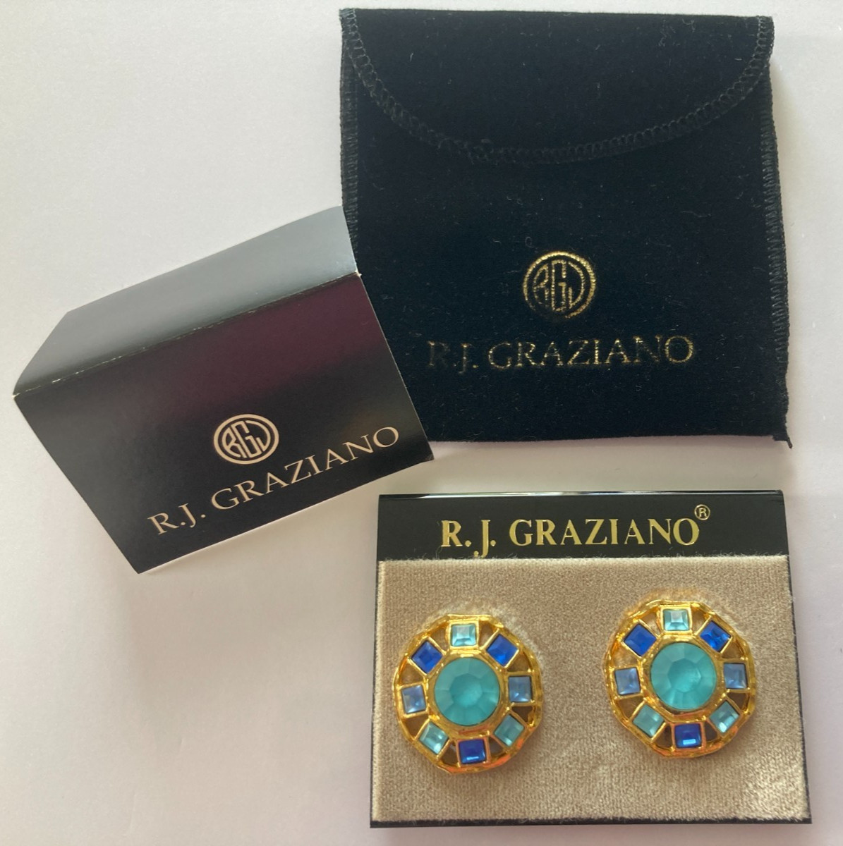 R.J. Graziano Clip on Earrings Blue Stones in Gold Color Setting