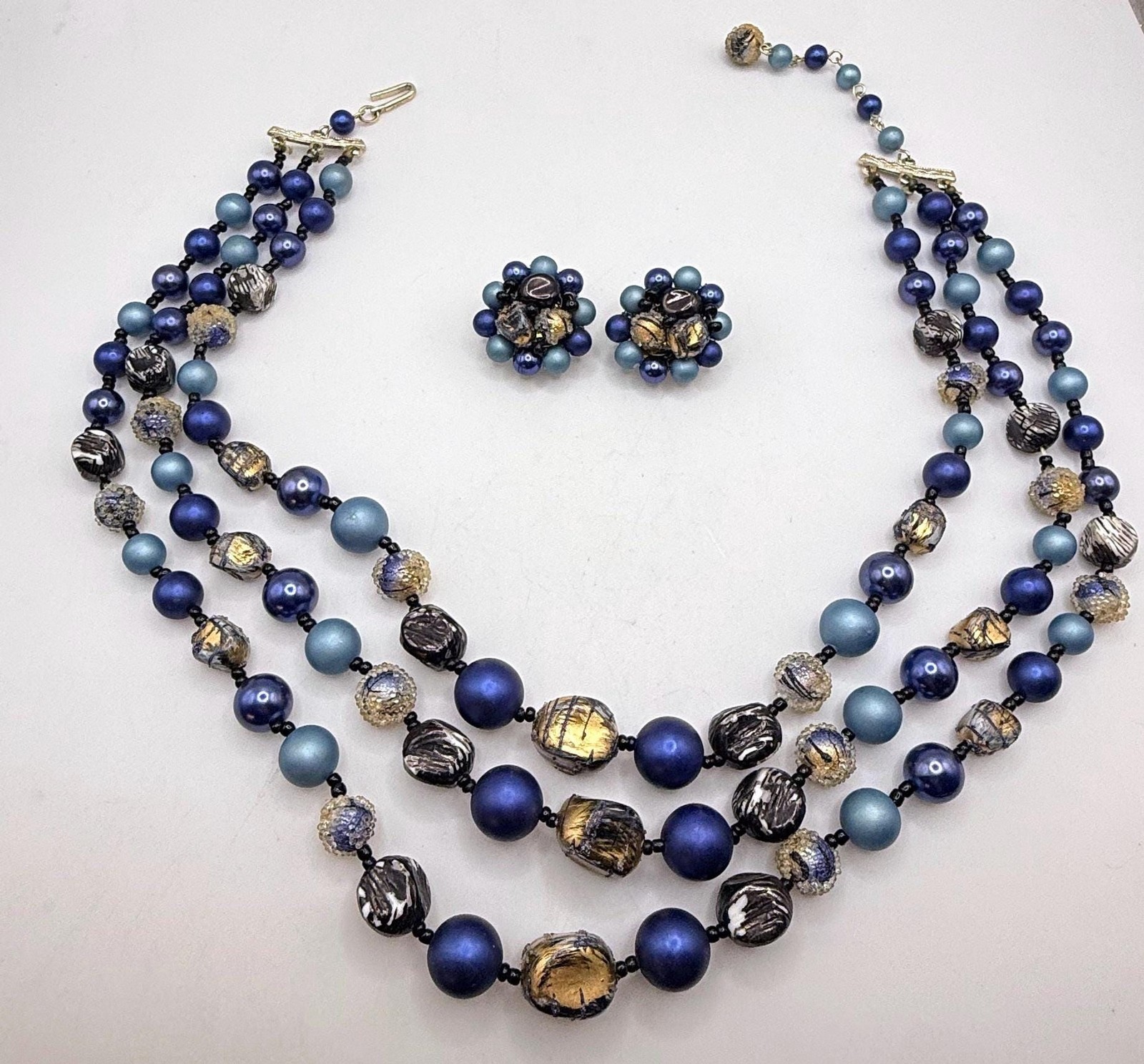 Vintage blue and gold two strand necklace and clip on earring set