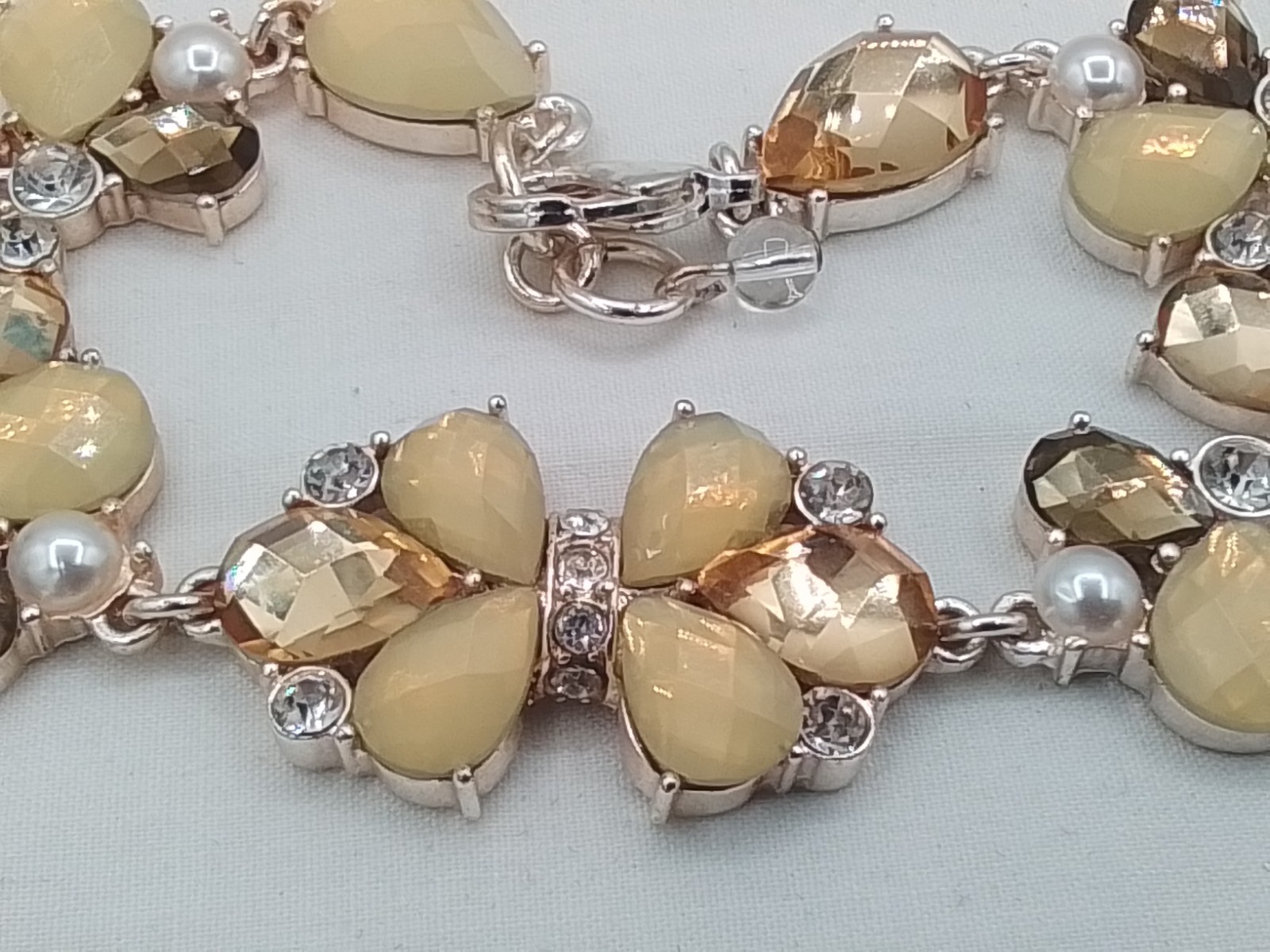 MILKY YELLOW FACETED HONEY-HUED MORPHO BUTTERFLY INSECT MOTIF TENNIS BRACELET