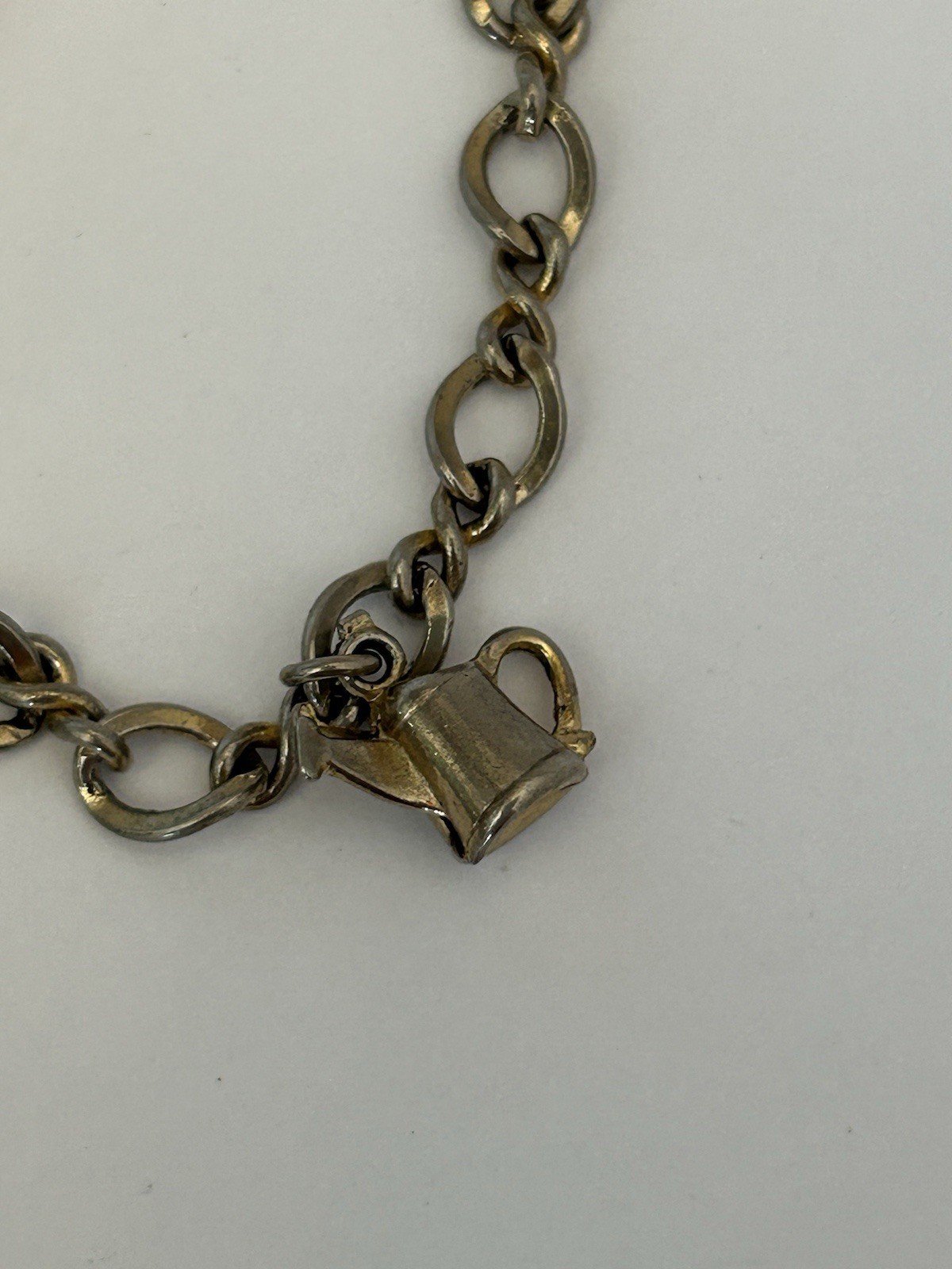 Vintage Silver Tone Bracelet With Hammer Wheelbarrow And Teapot Charms B17