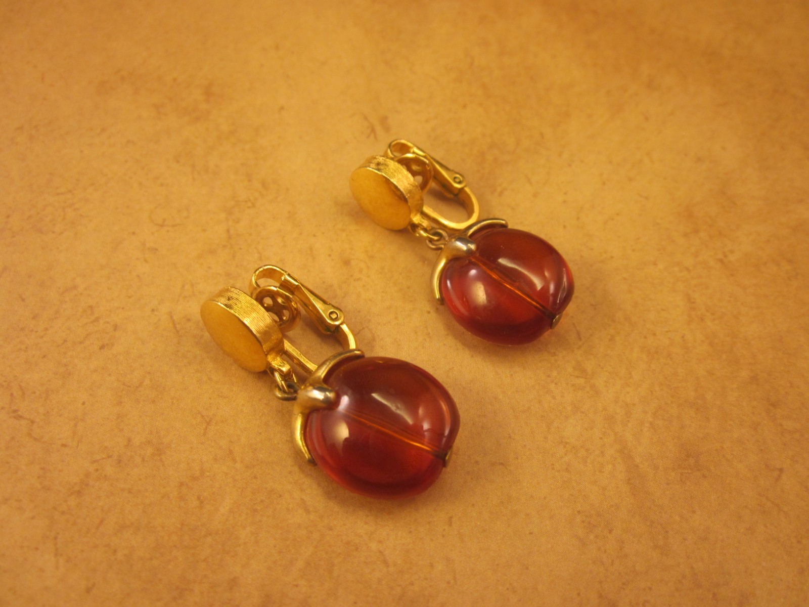 Crown Trifari Honey Amber Lucite “Waterfall Series” Gold Tone Clip-On Earrings