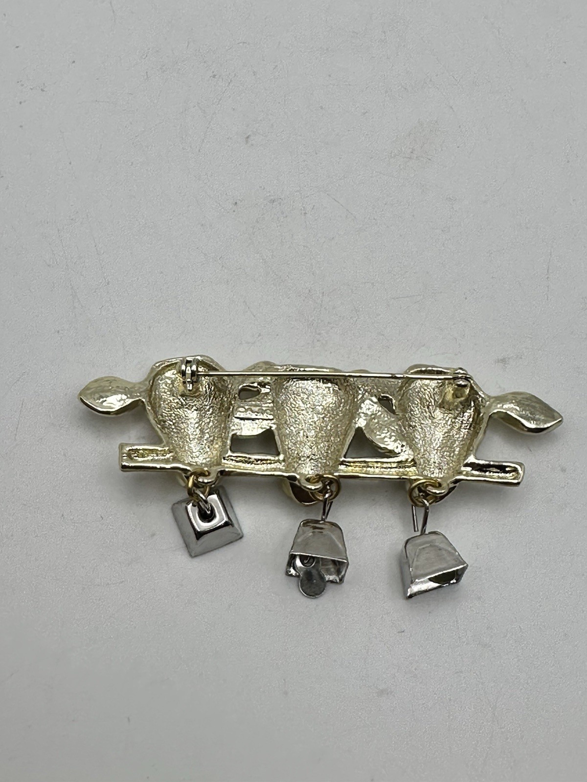 Vintage Gold Tone 3 Cow Brooch Pin with Dangling Silver Tone Bells Signed AJC