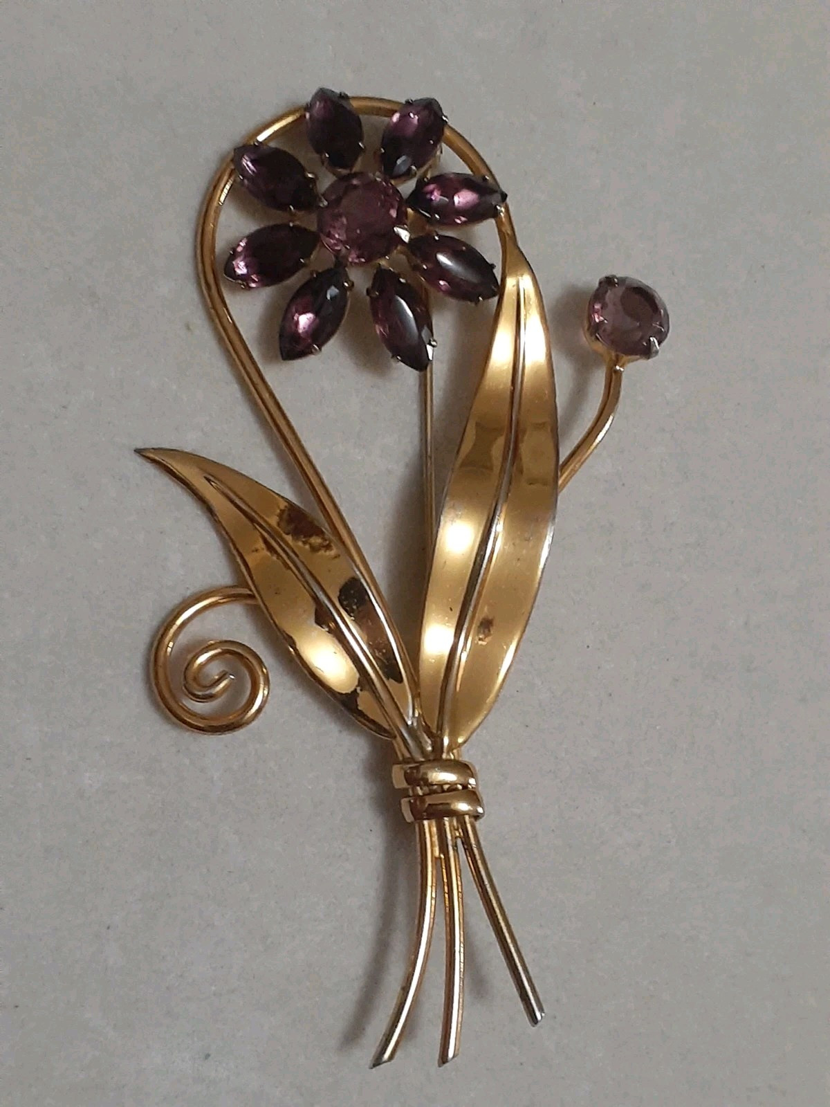 Sterling silver gold plated prong set purple glass flower & stem leaf brooch