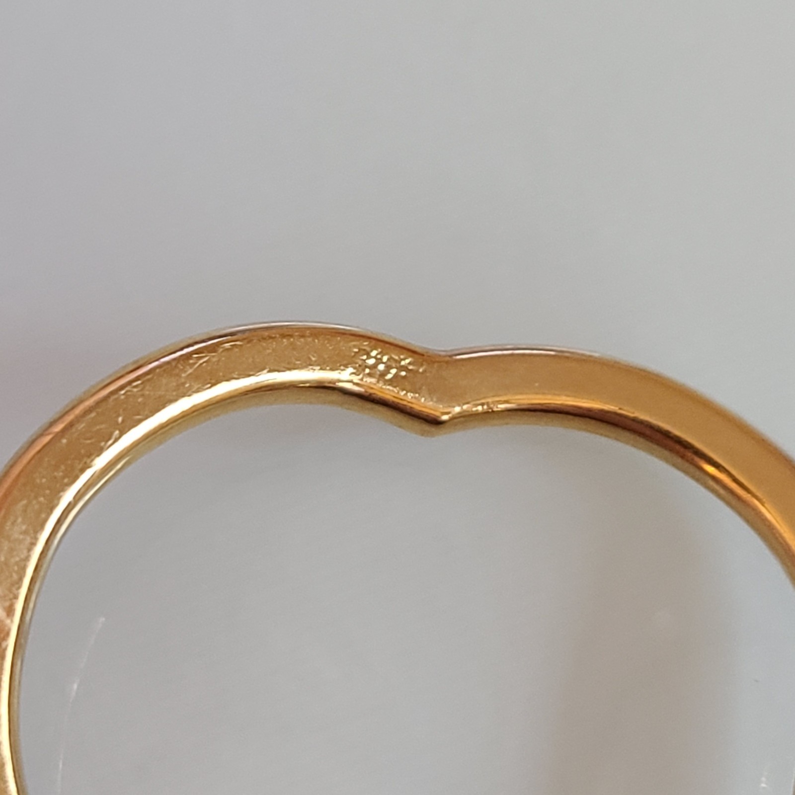 Gold-Tone Open Heart Hinged Cuff Bracelet with Multi-Color Rhinestones.