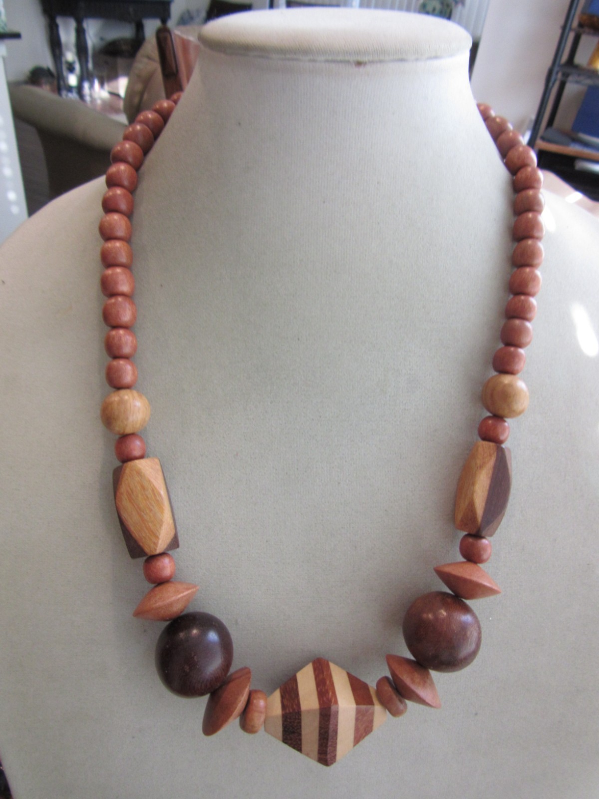 Vintage polished and faceted wood beaded necklace -22″ long