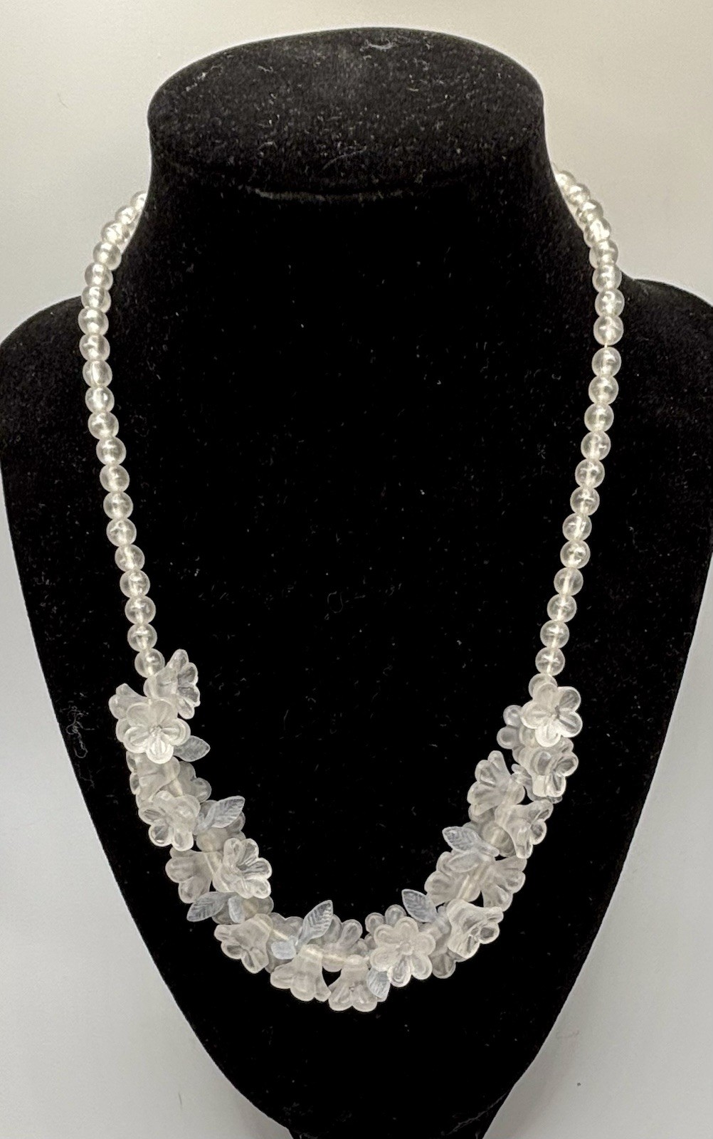 Vintage lucite floral cluster bib necklace molded flowers and leaves. 18”