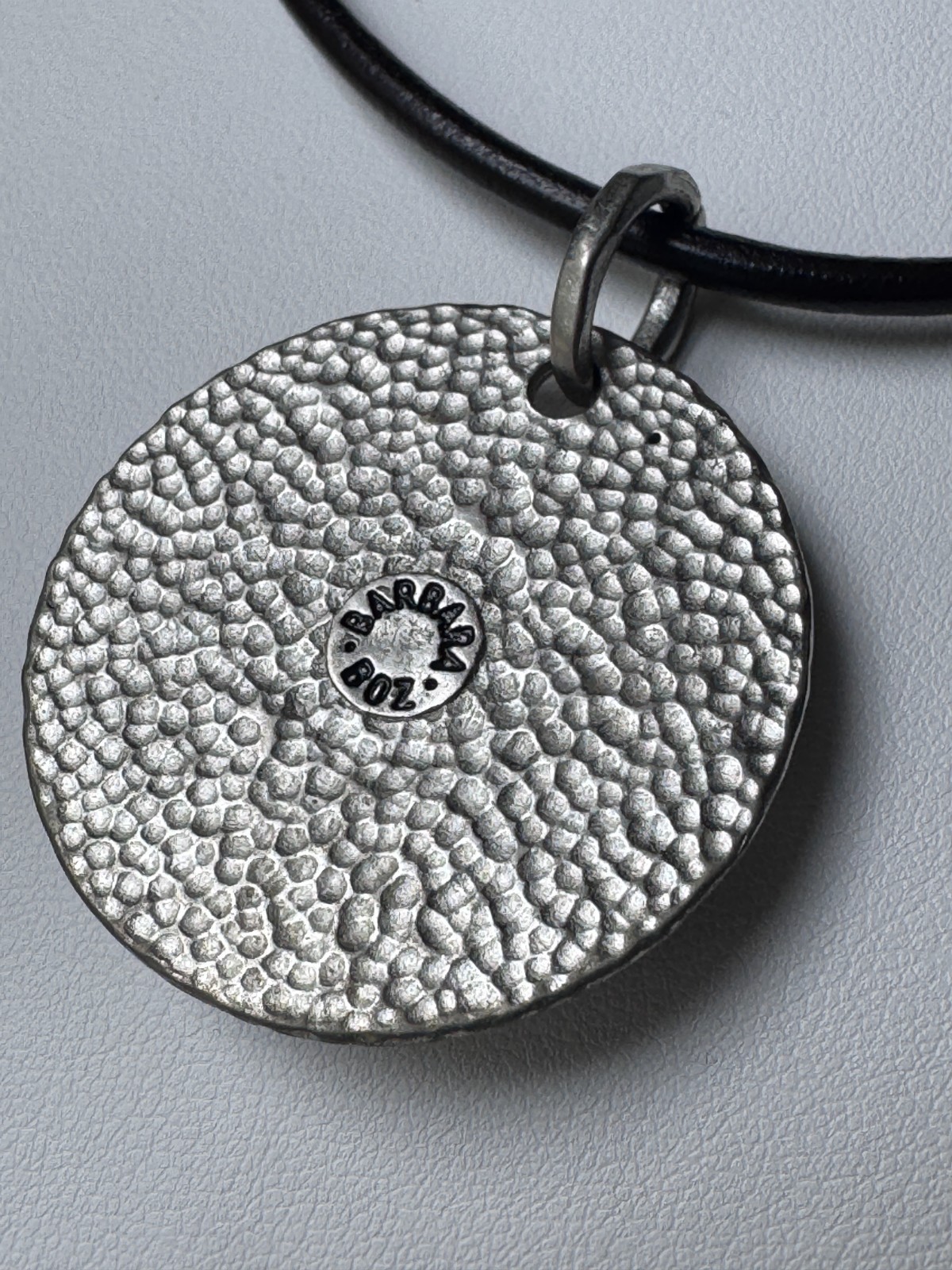 Pre-Owned BARBARA BOZ Round Rhinestone Pendant, 18″ Unmarked Leather Necklace
