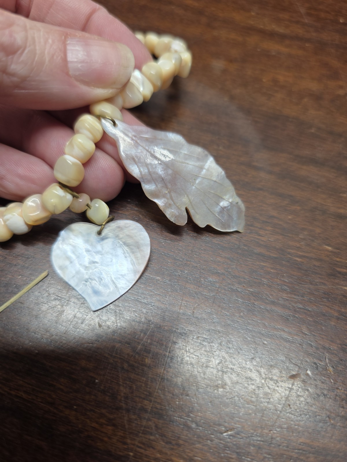 Vintage Coral necklace made of beads and carved shell leaves Gorgeous