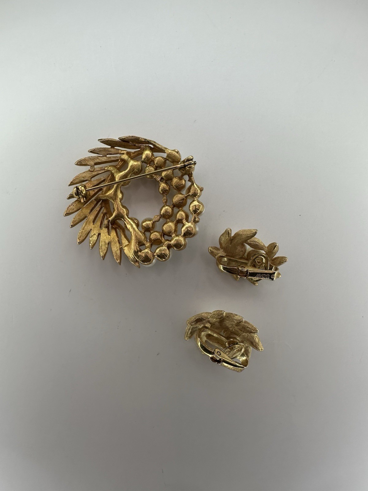 Vintage brooch Swirl Gold Tone With Faux Pearls Sold With Avon Clip Earrings
