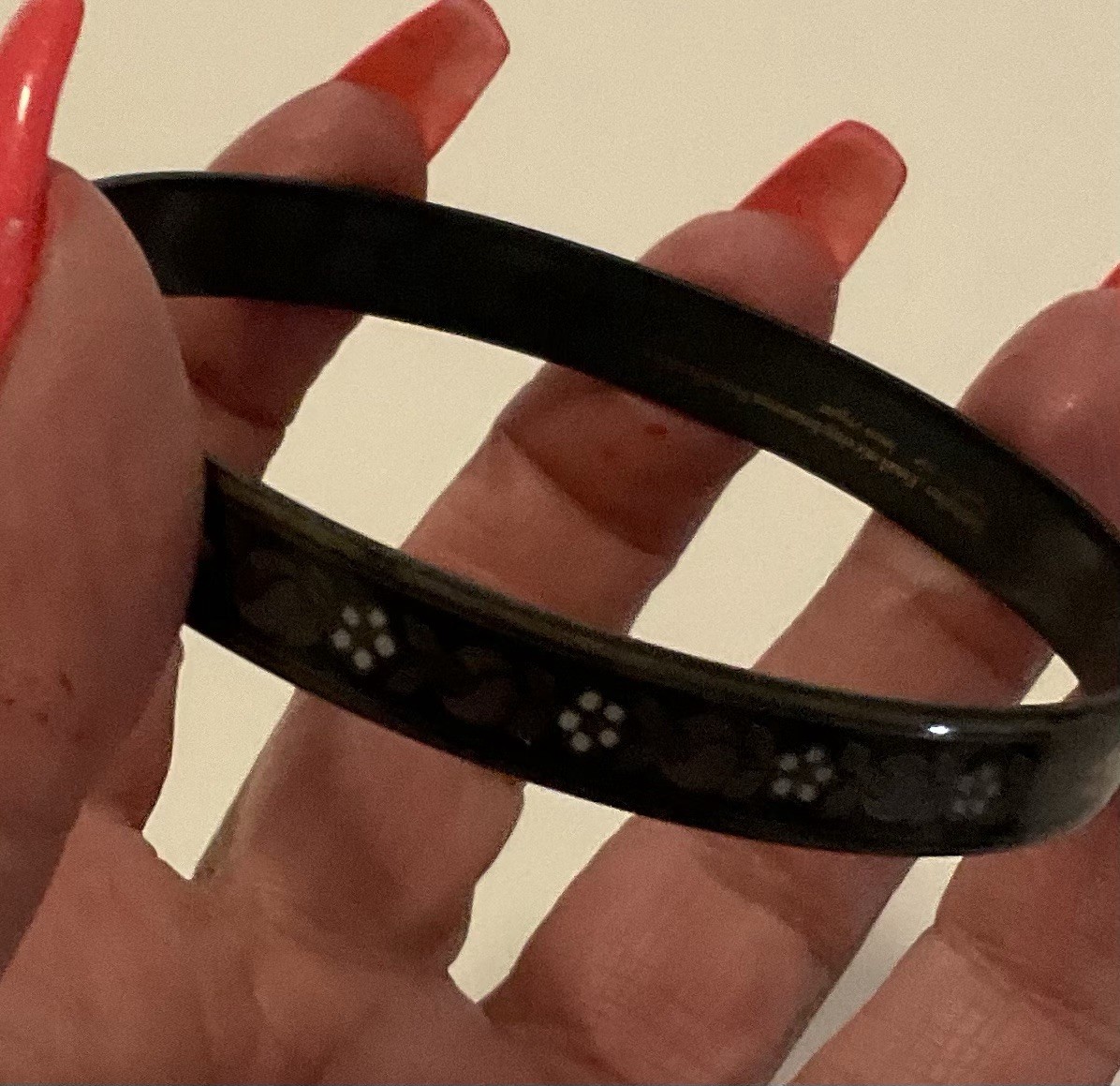Michael Frey Enamel Bangle With A Black Enamel Finish And Delicate Flowers
