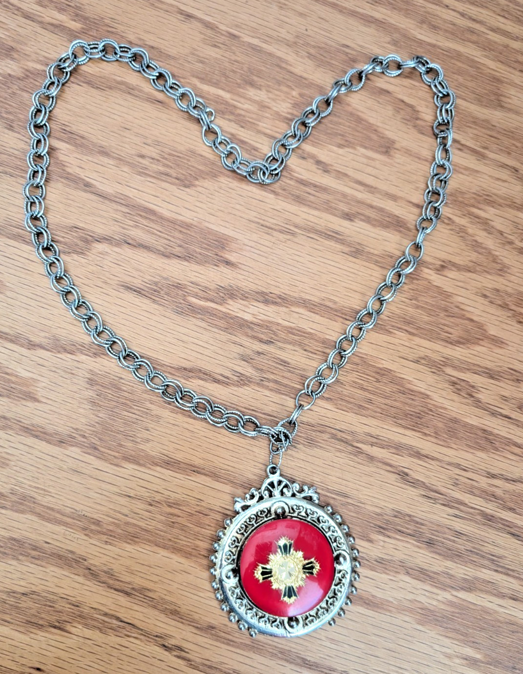 Red pendant with golden 26″ chain and accents – VGG 66 years old