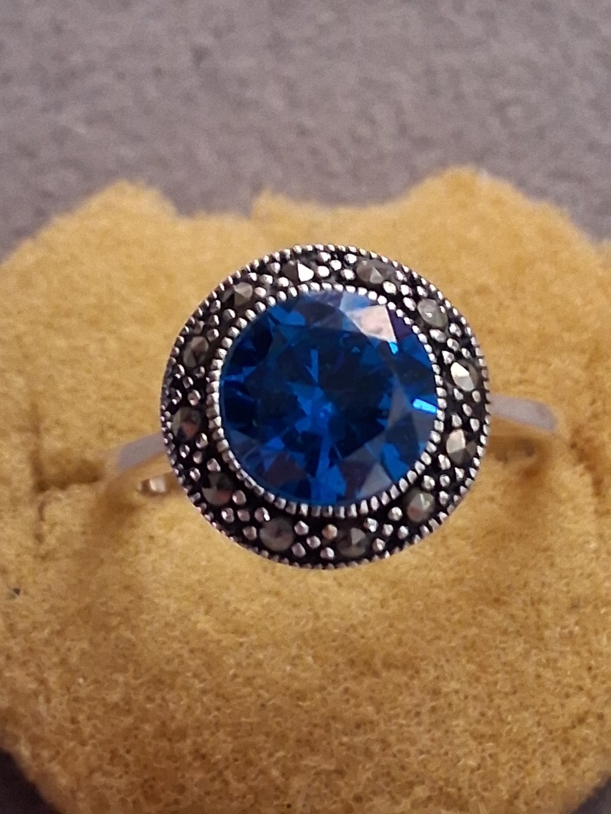 Blue faceted & marcasite halo ring, silverplated, round setting, SZ 6.75