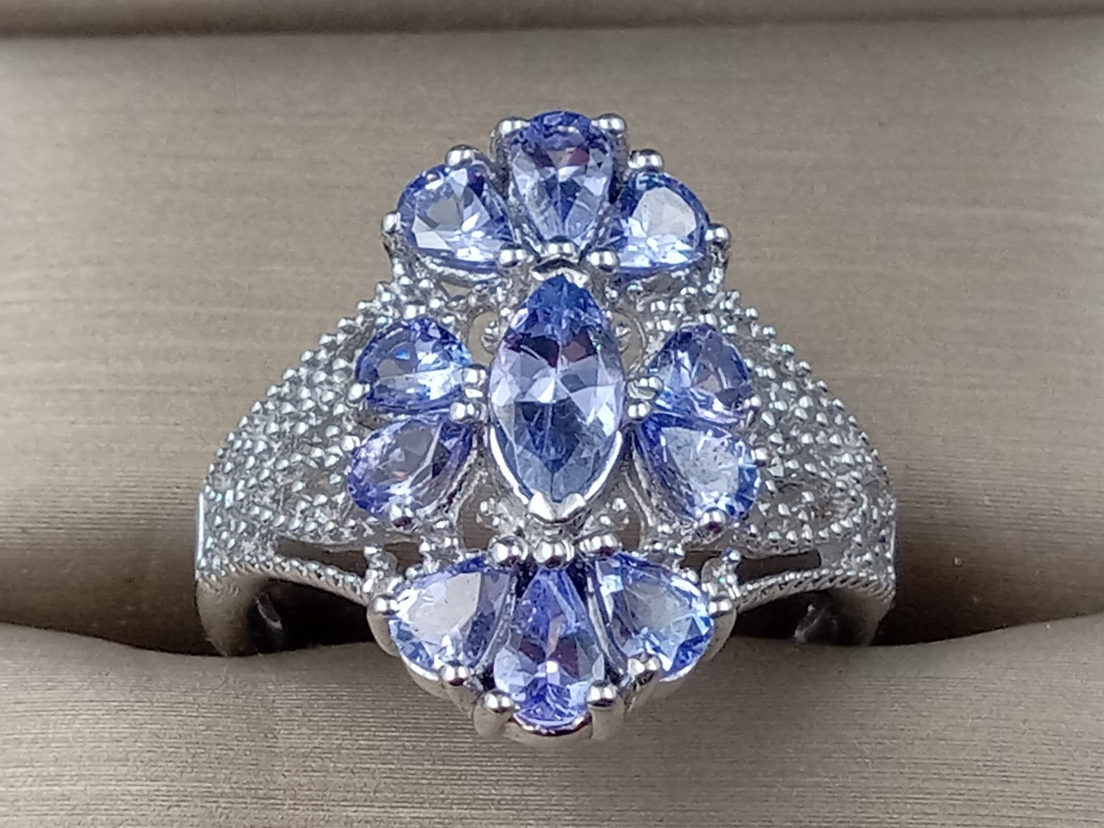 Sterling Silver Size 8 Ring w. Intricate multiple Iolite Gemstones Setting