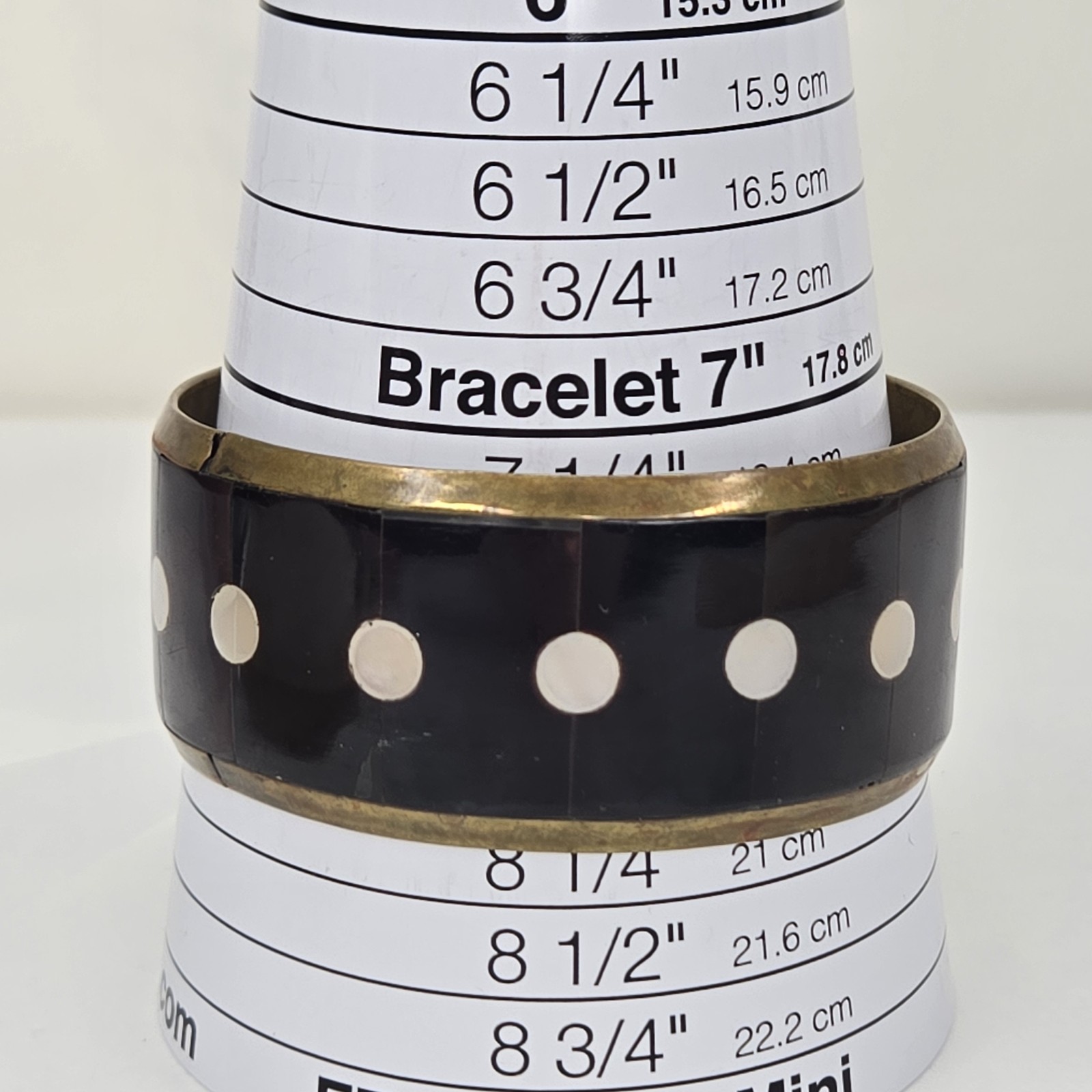 Vintage 8 Inch Gold Tone Metal Black Stone And White Shell Inlay Bangle Bracelet