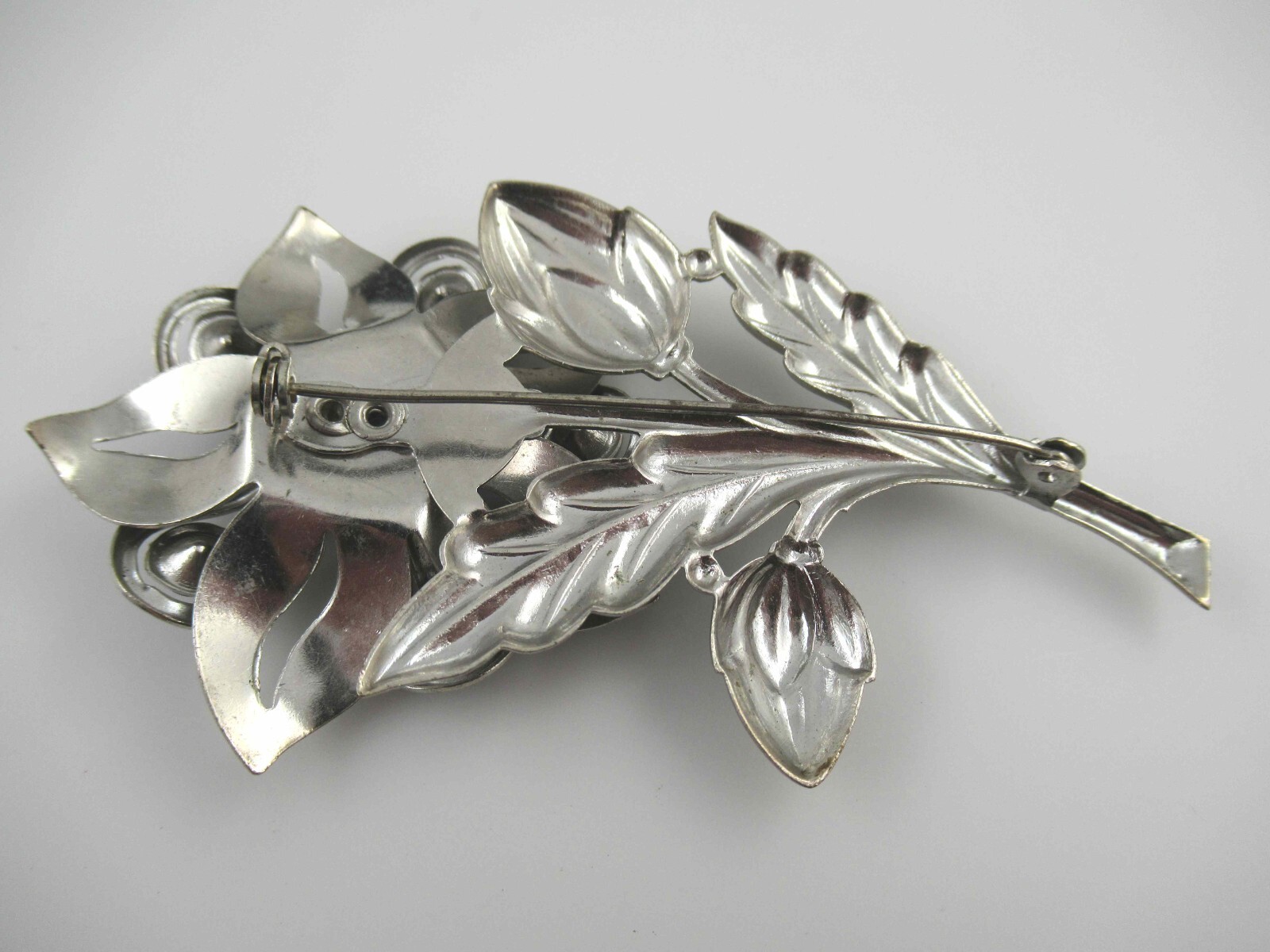Vintage Purple/Blue Rhinestone on Silver Tone Stamped Metal Flower Brooch, Pin
