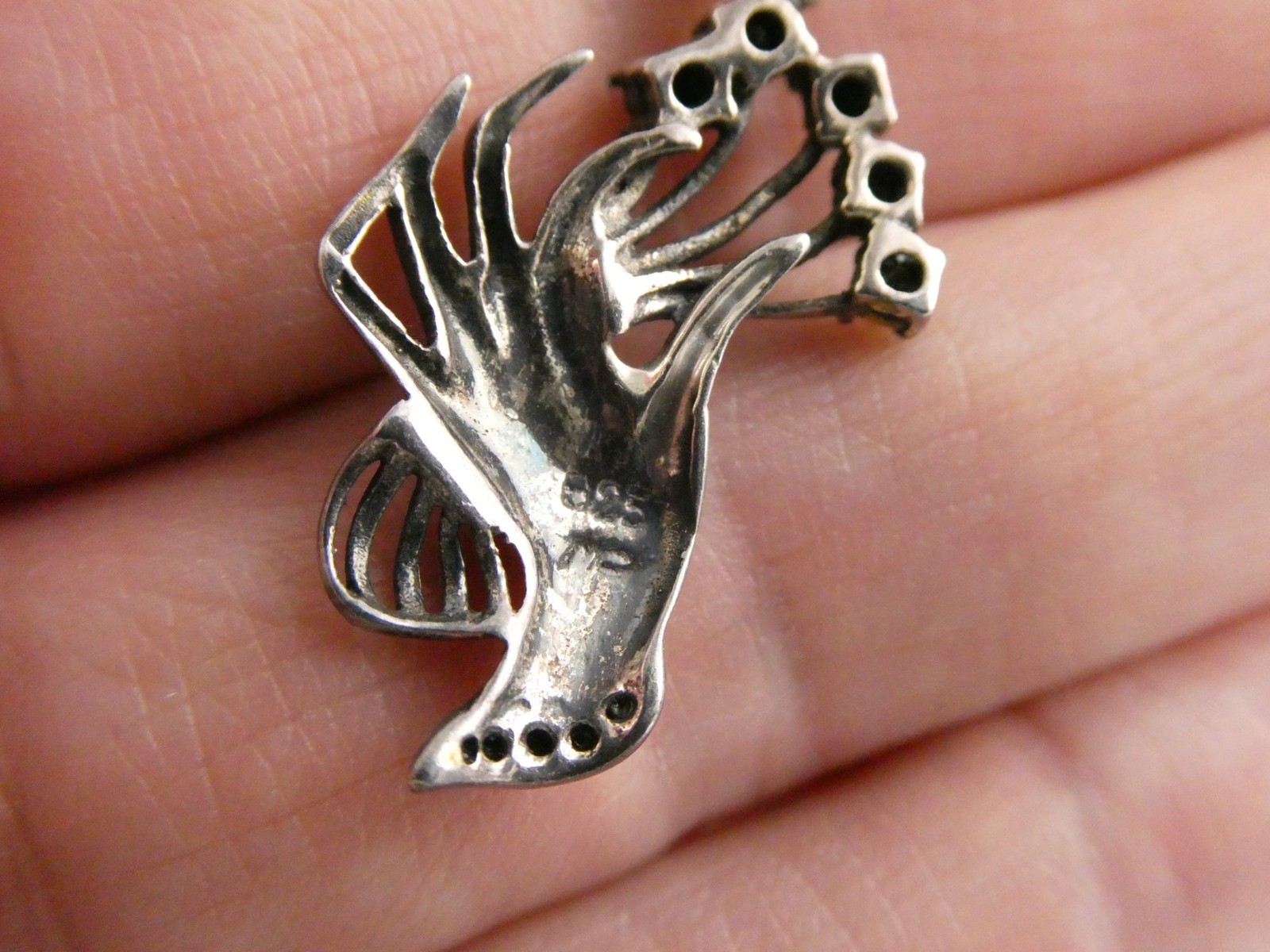 Marsala CW Sterling Silver Hand Holding Black Onyx Flowers Marcasite Pendant 2g