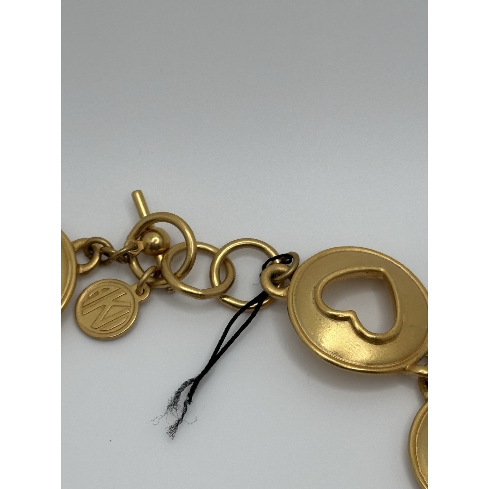 Vintage Anne Klein Necklace Matte Gold Tone Heart Star Moon Cut Out Round Link
