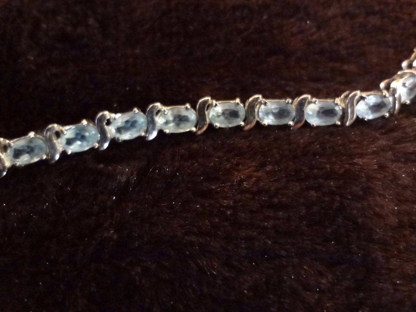#48-DBJ-925 STERLING SILVER BRACELET LOADED WITH BEAUTIFUL STONES