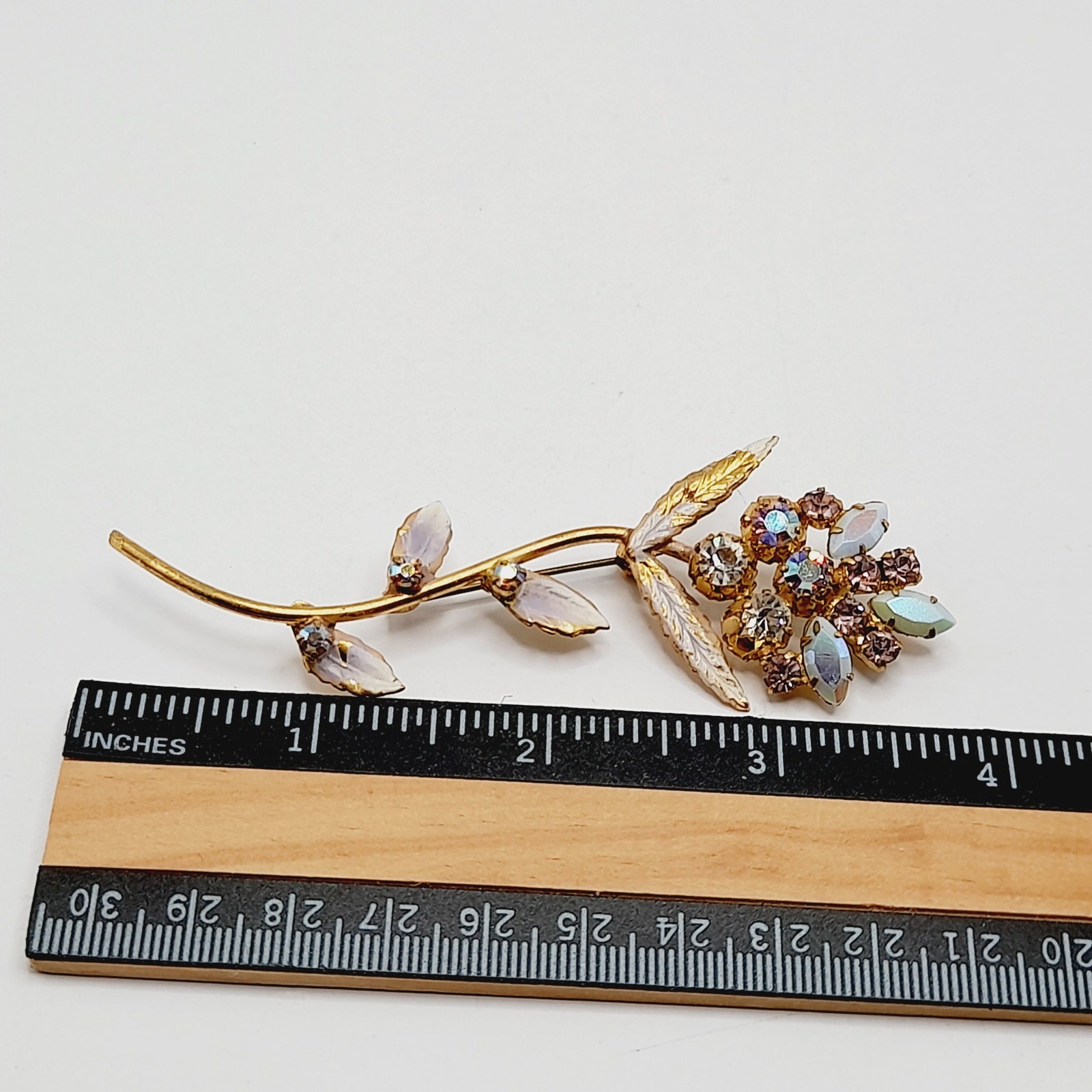 Vintage Gold Tone Floral Brooch AB Rhinestones White Enamel Leaves